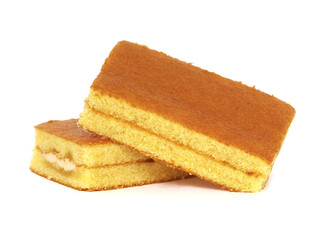 Sponge Cake with fruit cream filling isolated on white