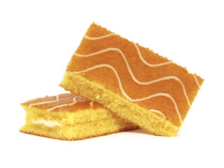 Sponge cake bars with milk cream filling isolated on white
