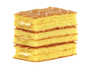 Sponge cake bars with milk cream filling isolated on white