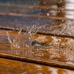 water drops on wooden surface