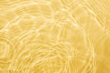 Soft focus lite yellow cosmetic moisturizer floral water, micellar toner, or emulsion abstract...