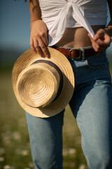 young woman with a hat