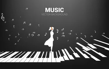 Deurstickers Vector silhouette of woman standing with piano key with flying music note . Concept background piano music and recreation. © Panithan