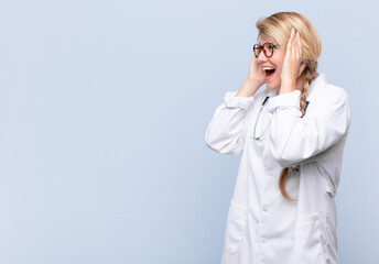  feeling happy, excited and surprised, looking to the side with both hands on face