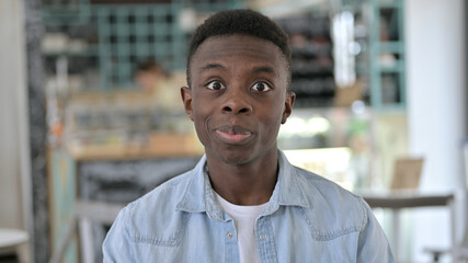 Fototapeta premium Surprised Happy Young African Man, Eyed Wide Opened