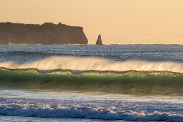 Waves breaking in Japan. The Pacific Ocean & its waves often generated by a Typhoon. The stunning...