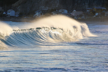 Waves breaking in Japan. The Pacific Ocean & its waves often generated by a Typhoon. The stunning...