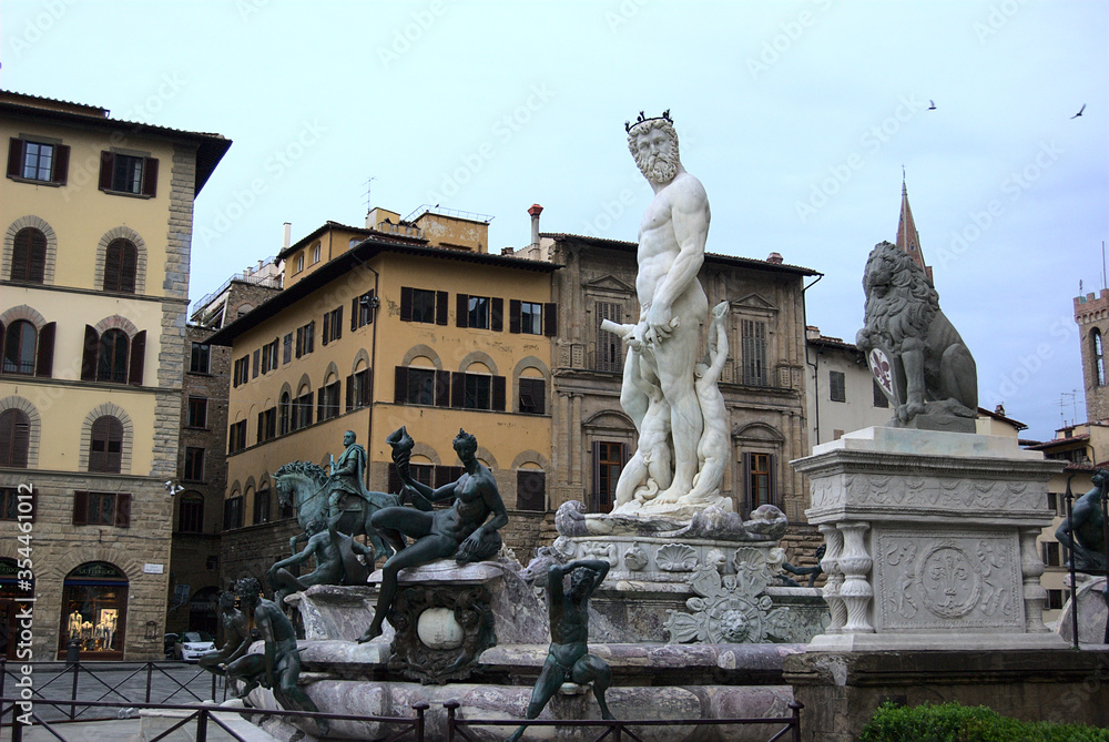 Wall mural Neptune fountain located in Piazza della Signoria in Florence, Italy