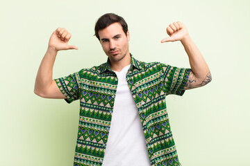  feeling proud, arrogant and confident, looking satisfied and successful, pointing to self