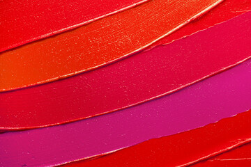 Lip gloss or lipstick pink red orange smudge background texture - obrazy, fototapety, plakaty
