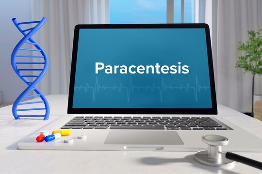 Paracentesis. Medicine/healthcare. Computer in the office of a surgery. Text on screen. Laptop of a doctor. Science/health