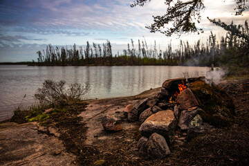 Evening campfire in the forest 