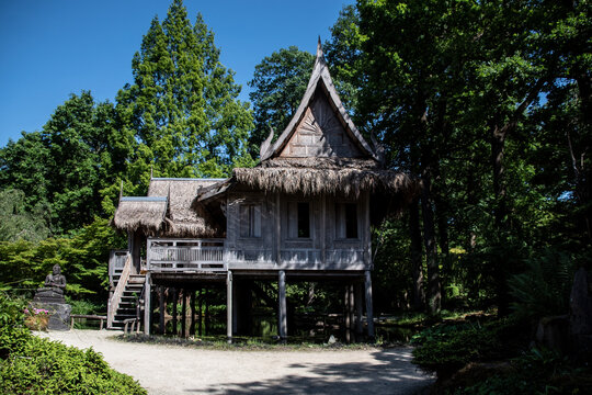 Arcen, The Netherlands - 28.5.2020 - Traditional asian stilt house in the castle park Kasteeltuinen