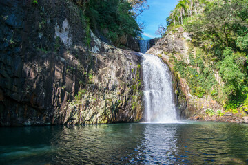 Fototapeta na wymiar Cachoeira Três Quedas - Riozinho - RS. Scenic landscape of the Três Quedas waterfall in Riozinho, Rio Grande do Sul, Brazil