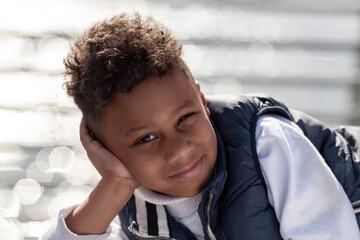 Portrait of a cute little african american boy smiling