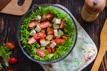 Cooking a salad of fresh vegetables, good nutrition