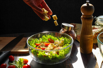 Cooking a salad of fresh vegetables, good nutrition