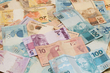 Fototapeta na wymiar Brazilian money background. Bills called Reais (Real).