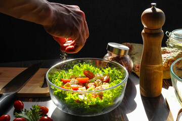 Cooking a salad of fresh vegetables, good nutrition