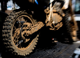 Picture Of A Muddy Dirt Bike Using Selective Focus
