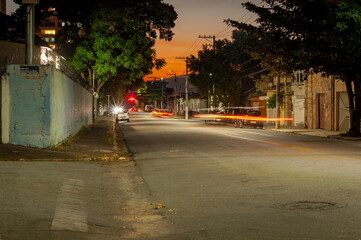sunset in the city, light painting
the street
