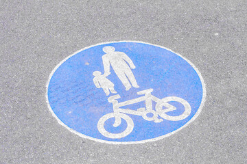 Pedal cyclists and pedestrians shared route floor sign in England