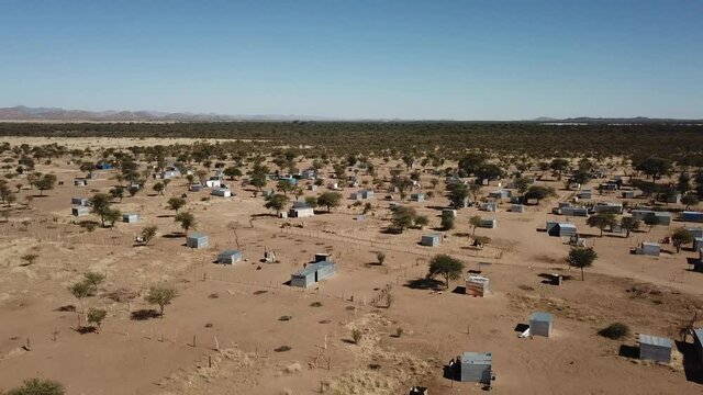 4K aerial drone video of Karibib, a small town in Erongo Mountains at B1 highway to west coast of Namibia and its township on hot sunny day in Erongo Region, central Namibia