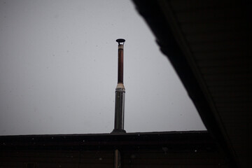 The roof of the house in cloudy weather.