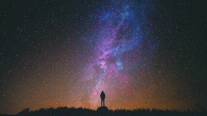 Universe video. Fly by universe video. Camera moves towards galaxy and nebula with stars flying by and a person's silhouette looks at the nebula . Video for spirituality, motivation and meditation.