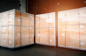 Large shipment pallets goods in interior warehouse storage. Cargo export. Warehouse industry shipping logisics.