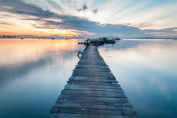 Real wooden bridge view of sunrise background