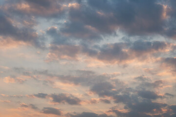 Fototapeta na wymiar Beautiful sunset sky above clouds with dramatic light