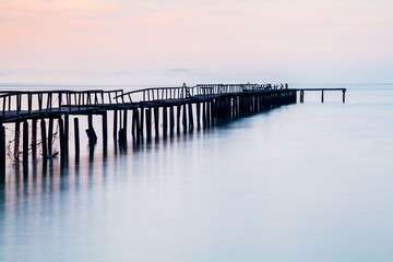 Fototapeta na wymiar Wooden bridge sunrise view for beautiful background