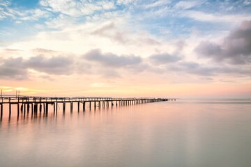 Fototapeta na wymiar Wooden bridge sunrise view for beautiful background