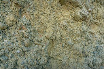 Close up of clay and gravel texture. Rock texture close up