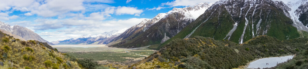 Fototapeta na wymiar Mountain valley landscape panorama with snow-capped mountains. New Zealand
