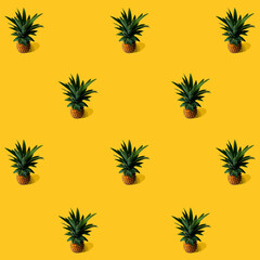 Fototapeta na wymiar trend pattern pineapple on orange minimalist concept photo