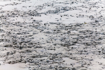 
View of blurry mud texture used for clay mask in beauty products