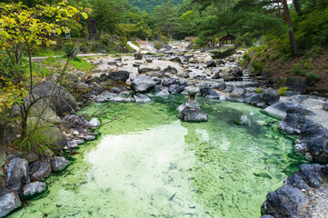 Outdoor hot spring pools, thermal pools in public park in Kusatsu, Japan