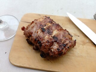 Pork ribs grilled over charcoal grill