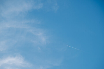 The picture of the blue sky and floating clouds