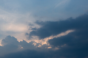 Naklejka na ściany i meble Background of dark clouds before a thunder-storm