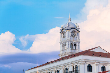Close up view of clock tower with blue sky in George Town Penang
