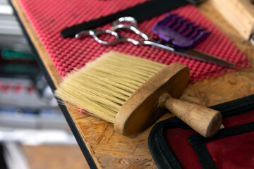 Vintage barber shop tools on red pad,Vintage hairdresser work space