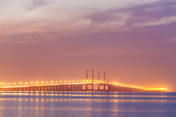 Penang Bridge view which located in the Straits of Malacca with venus and moon background