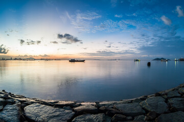 Sunrise or sunset landscape view by the shore for beautiful background