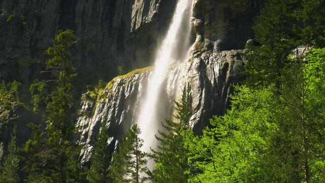 Torrent of water falling from amazing Waterfall in Spanish Pyrenees