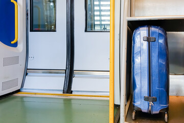 Big luggage keep in slot on airport train