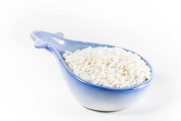 Raw glutinous sticky rice in a white isolated background