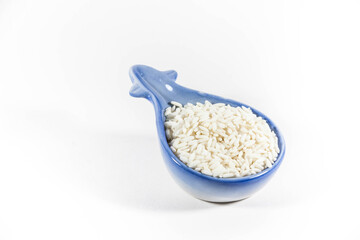 Raw glutinous sticky rice in a white isolated background